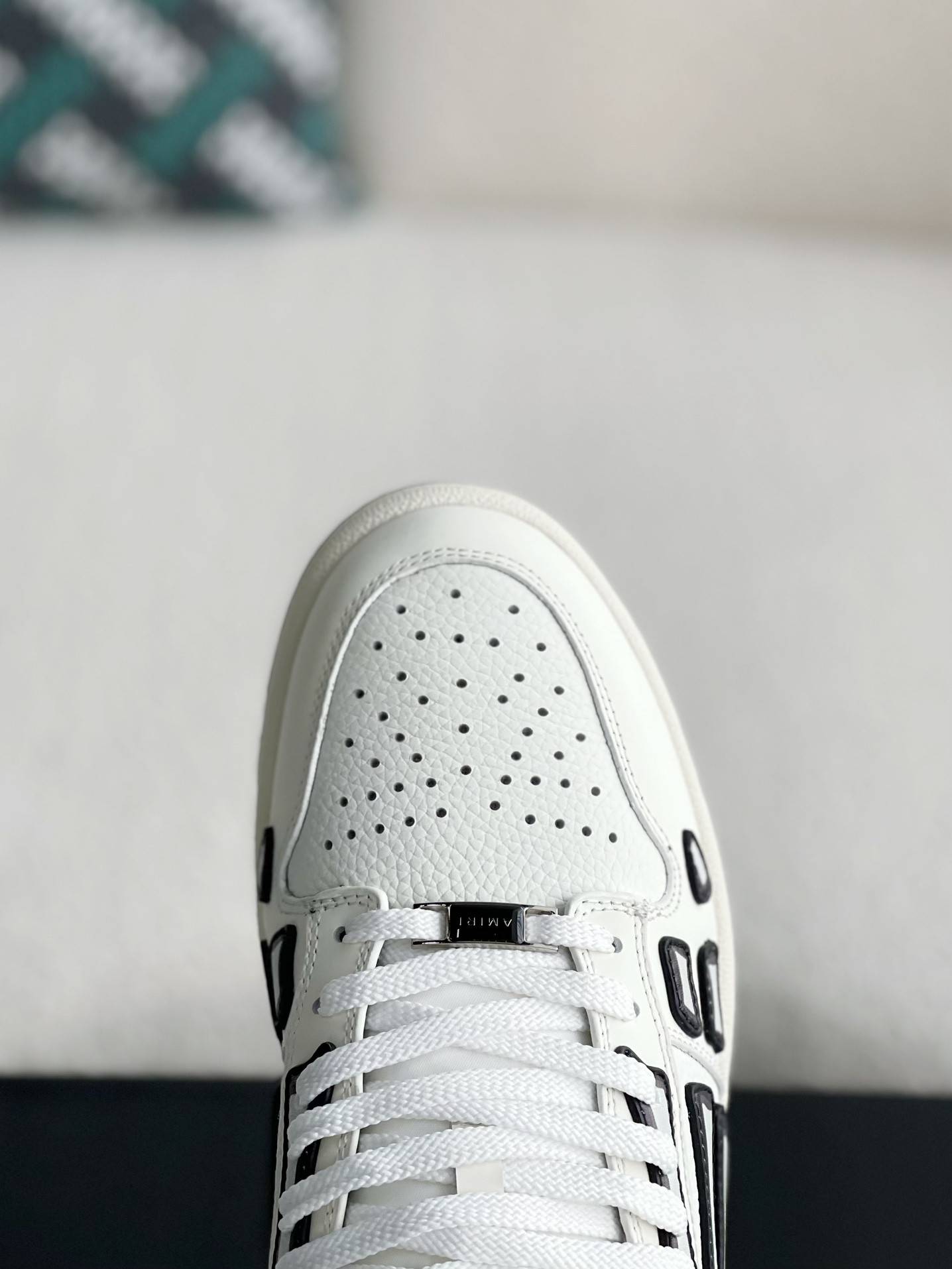A*RI Bone Sneakers
