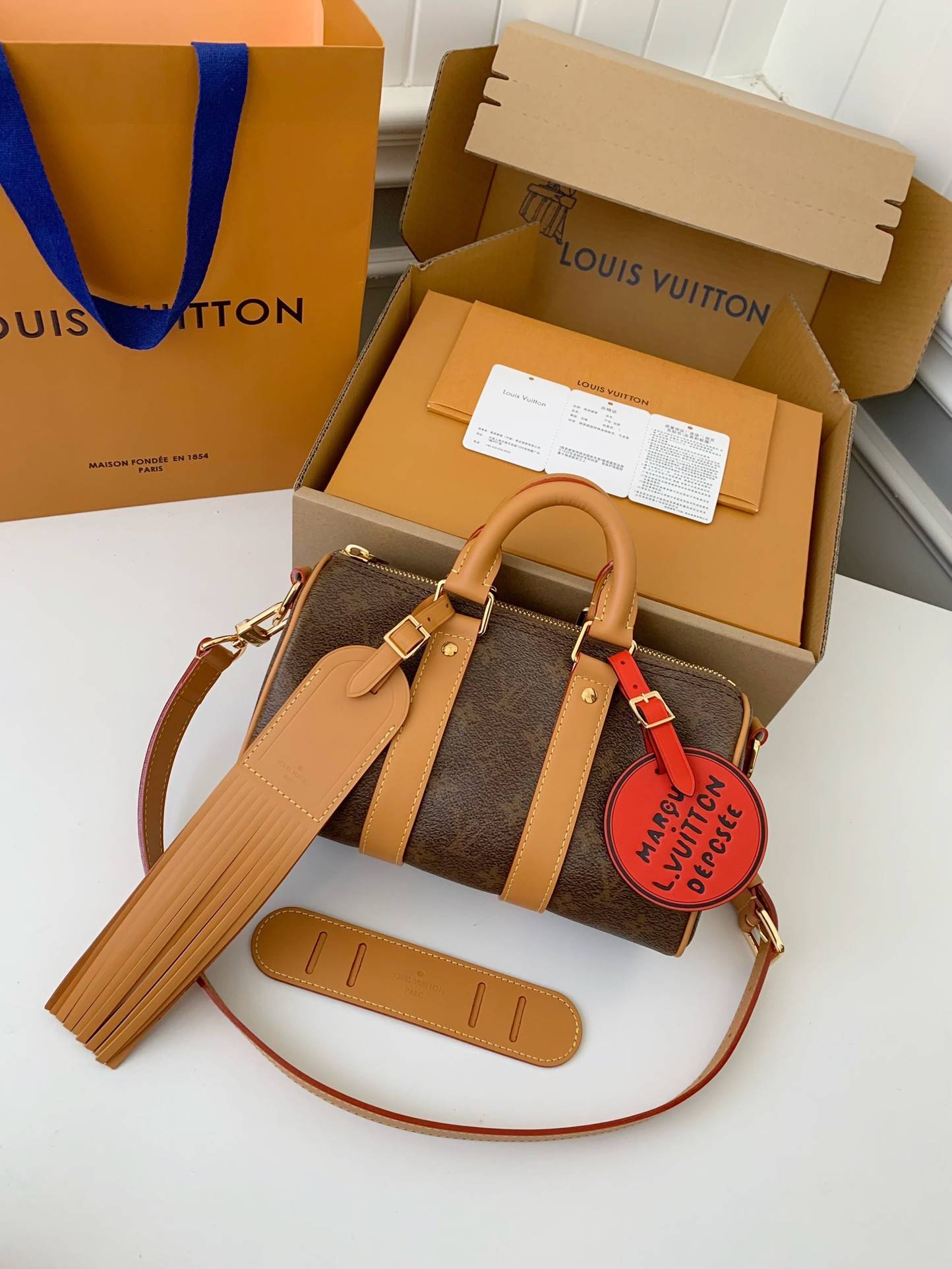 L*V The New Keepall Bandouli ère 25 handbag  M11542  Size：25*15*11cm